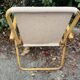 Rattan armchair and foldable canvas