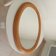 Vintage oval mirror in beech from the 70s/80s.