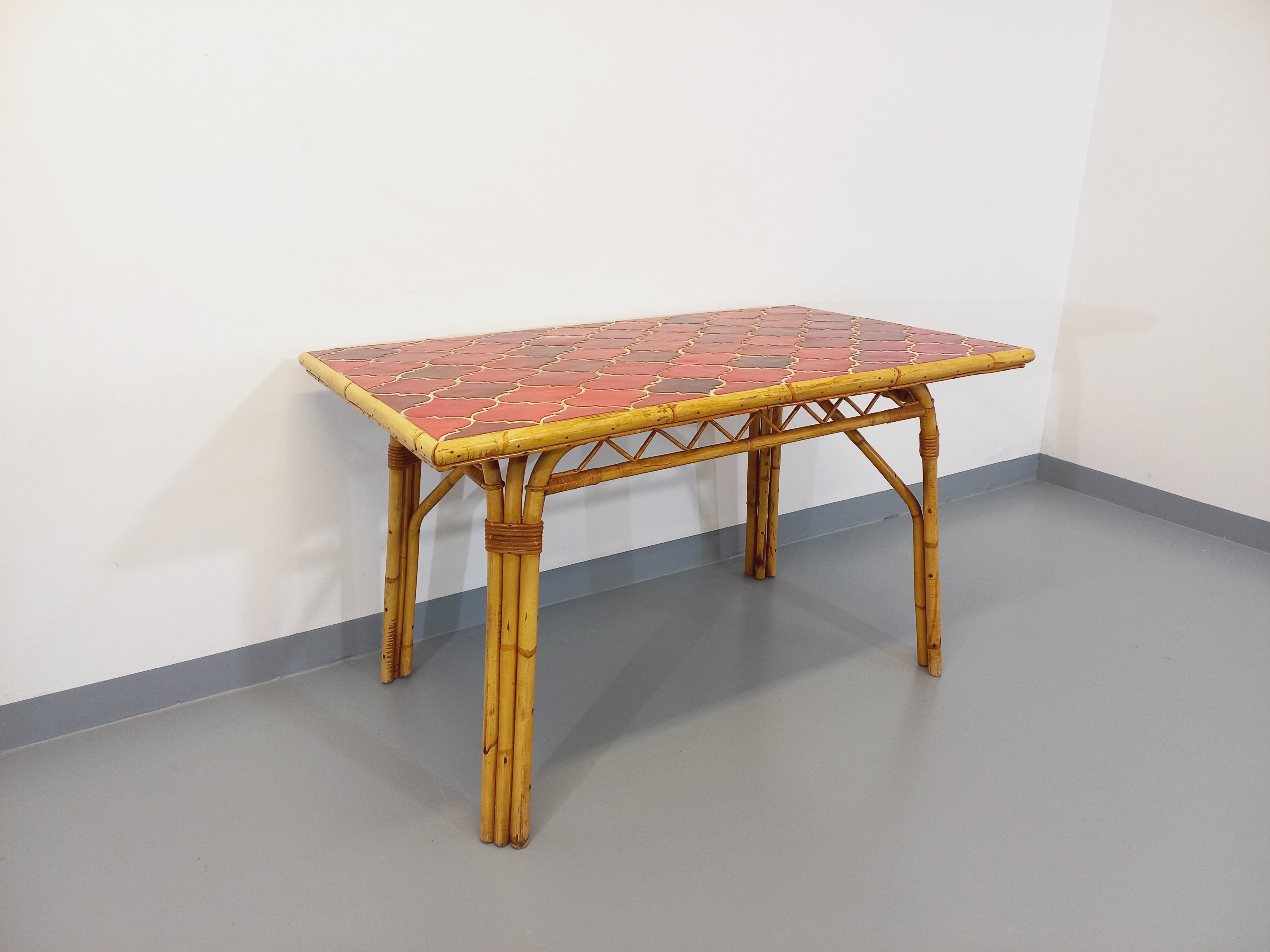 Vintage dining table in rattan and ceramic from Vallauris from the 50s and 60s