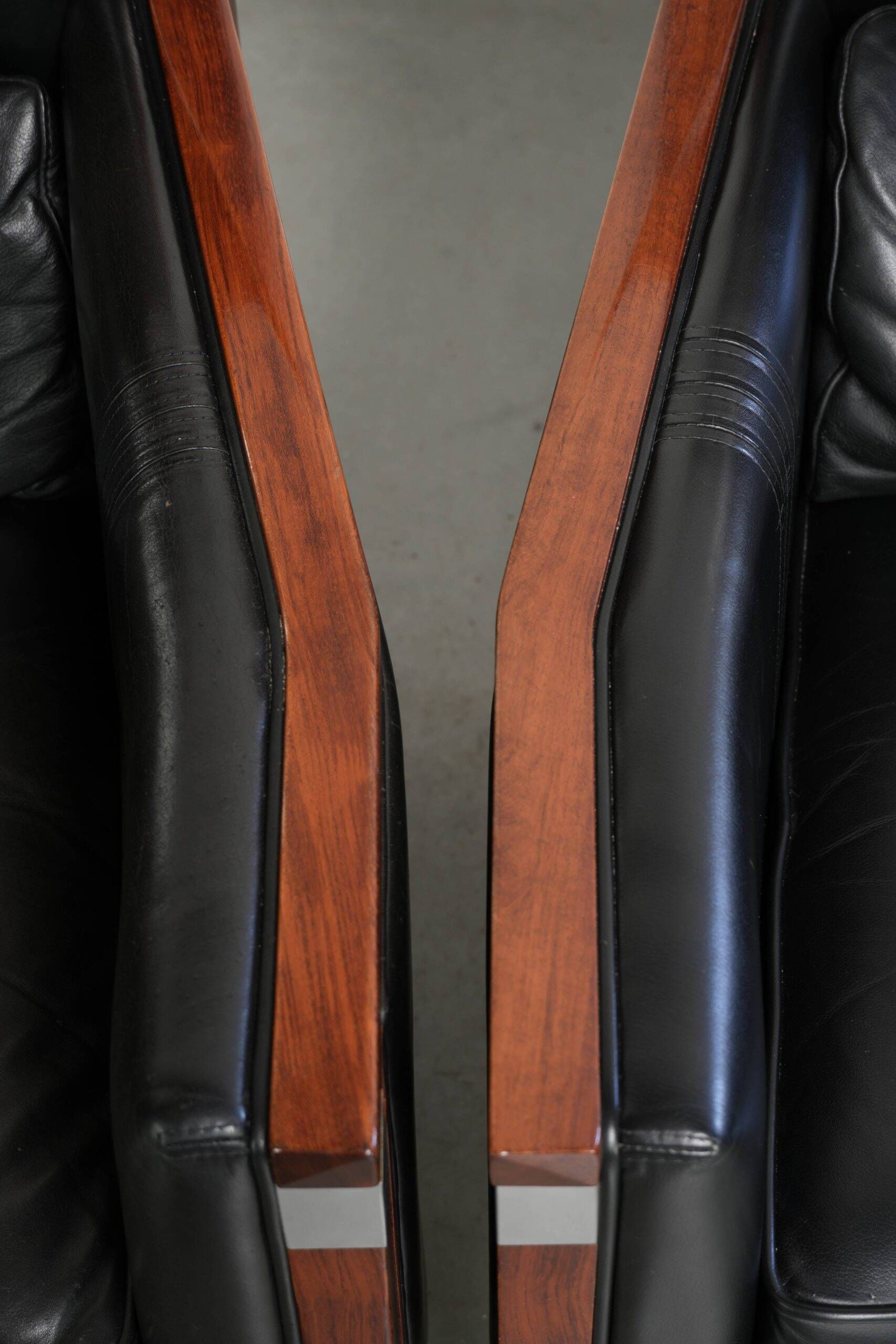 Set of 2 Art Deco design armchairs in black cowhide leather