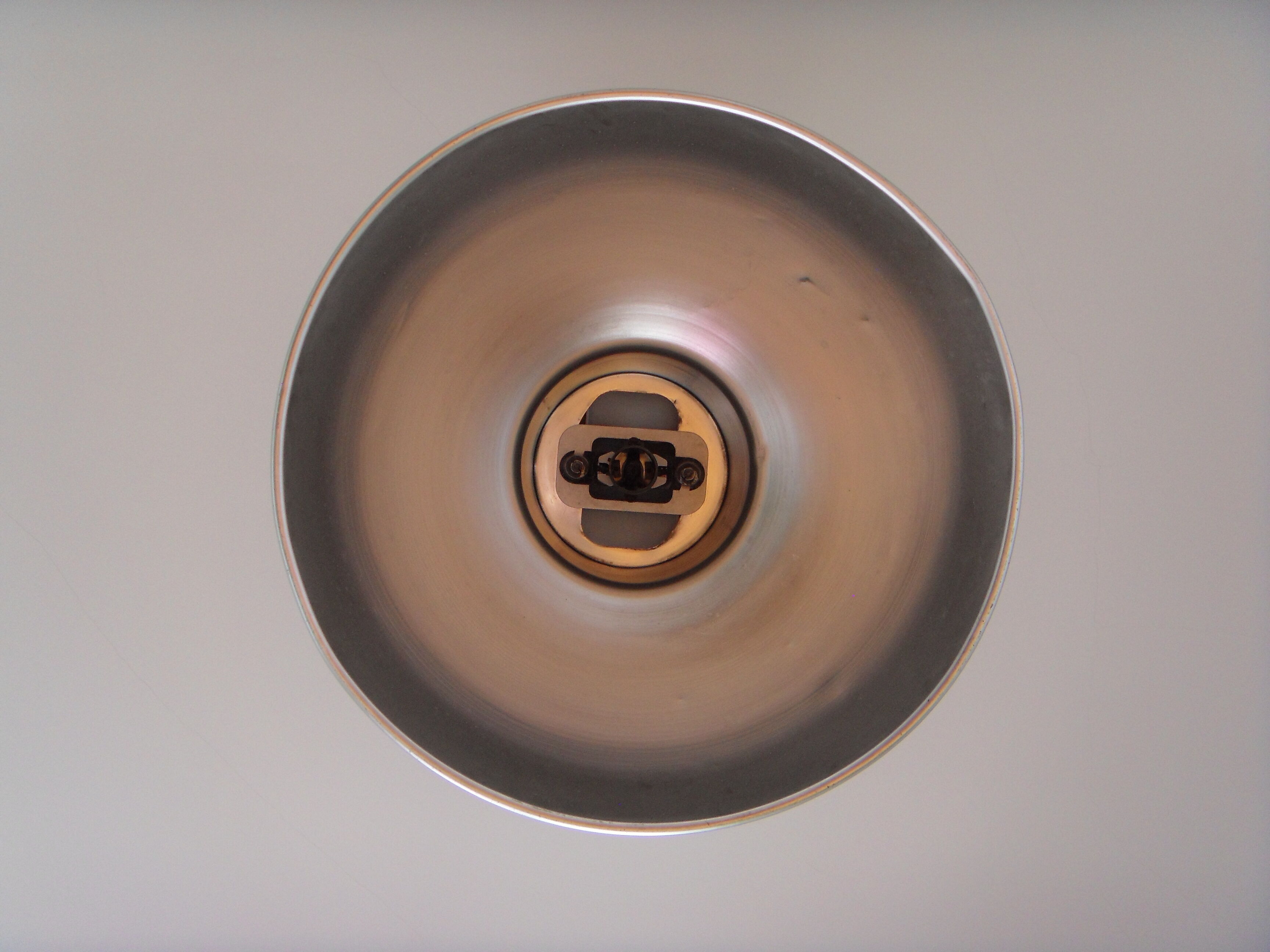 Large red aluminum lamp.