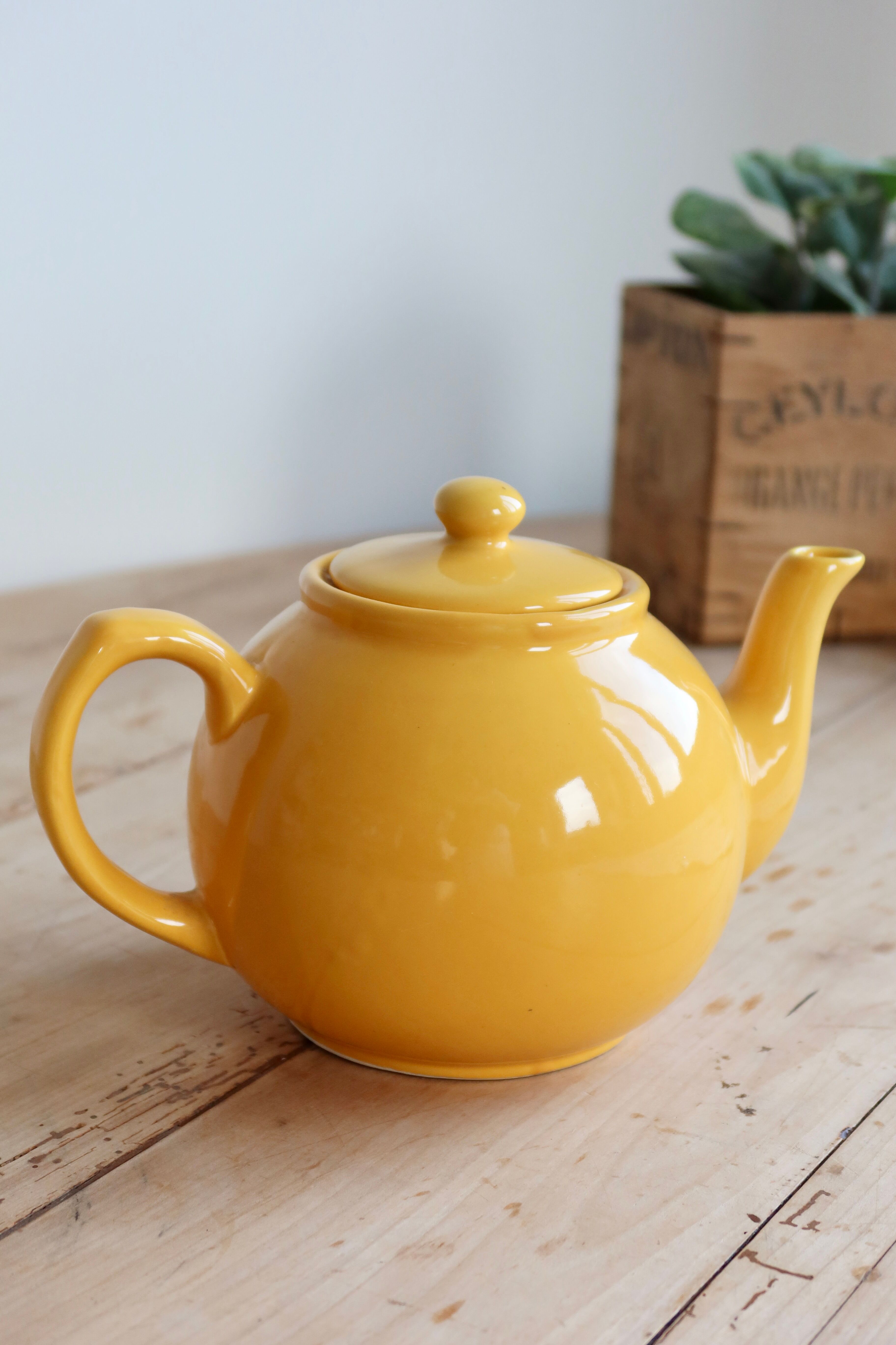 Vintage bright yellow ceramic teapot