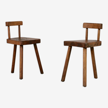 Pair of tripod stools with brutalist backrests, France, circa 1960