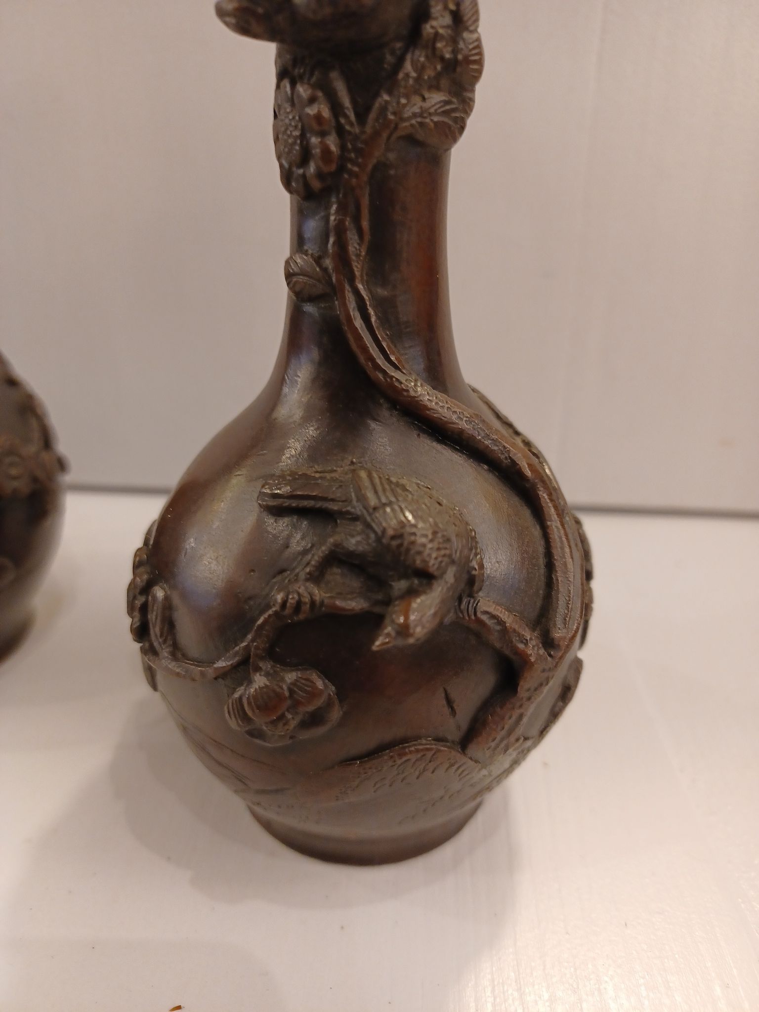 Pair of bronze soliflore vases. Japan, 19th century.