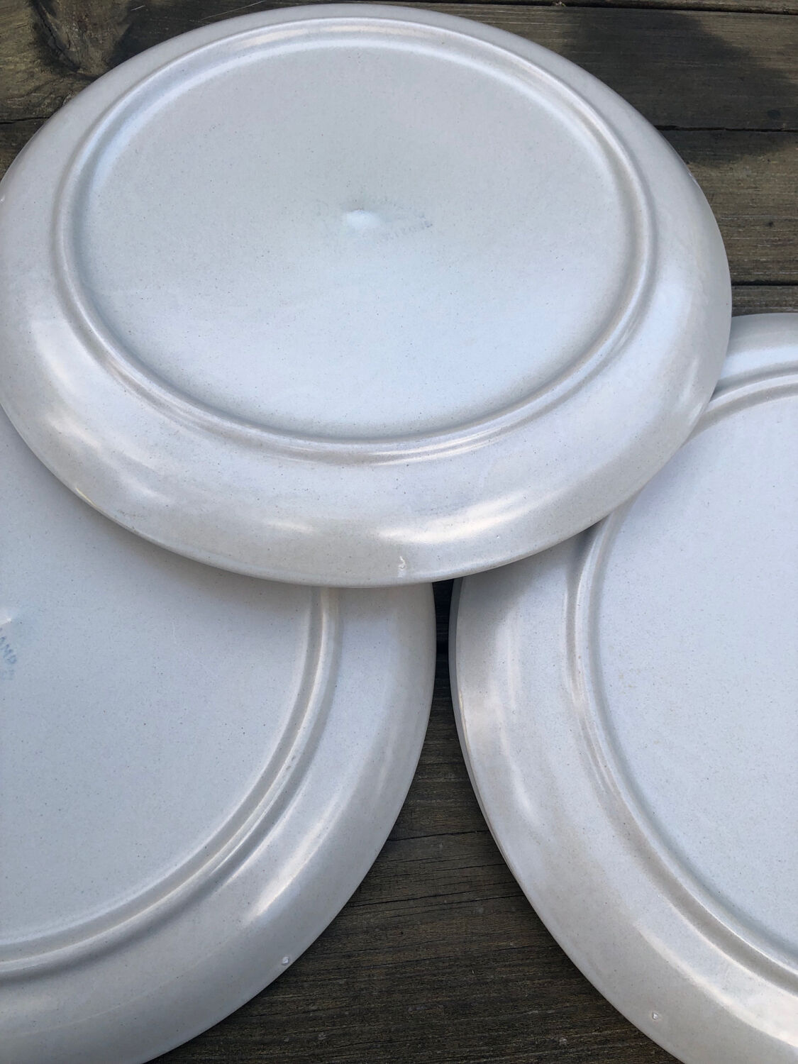 7 Longchamp stoneware plates