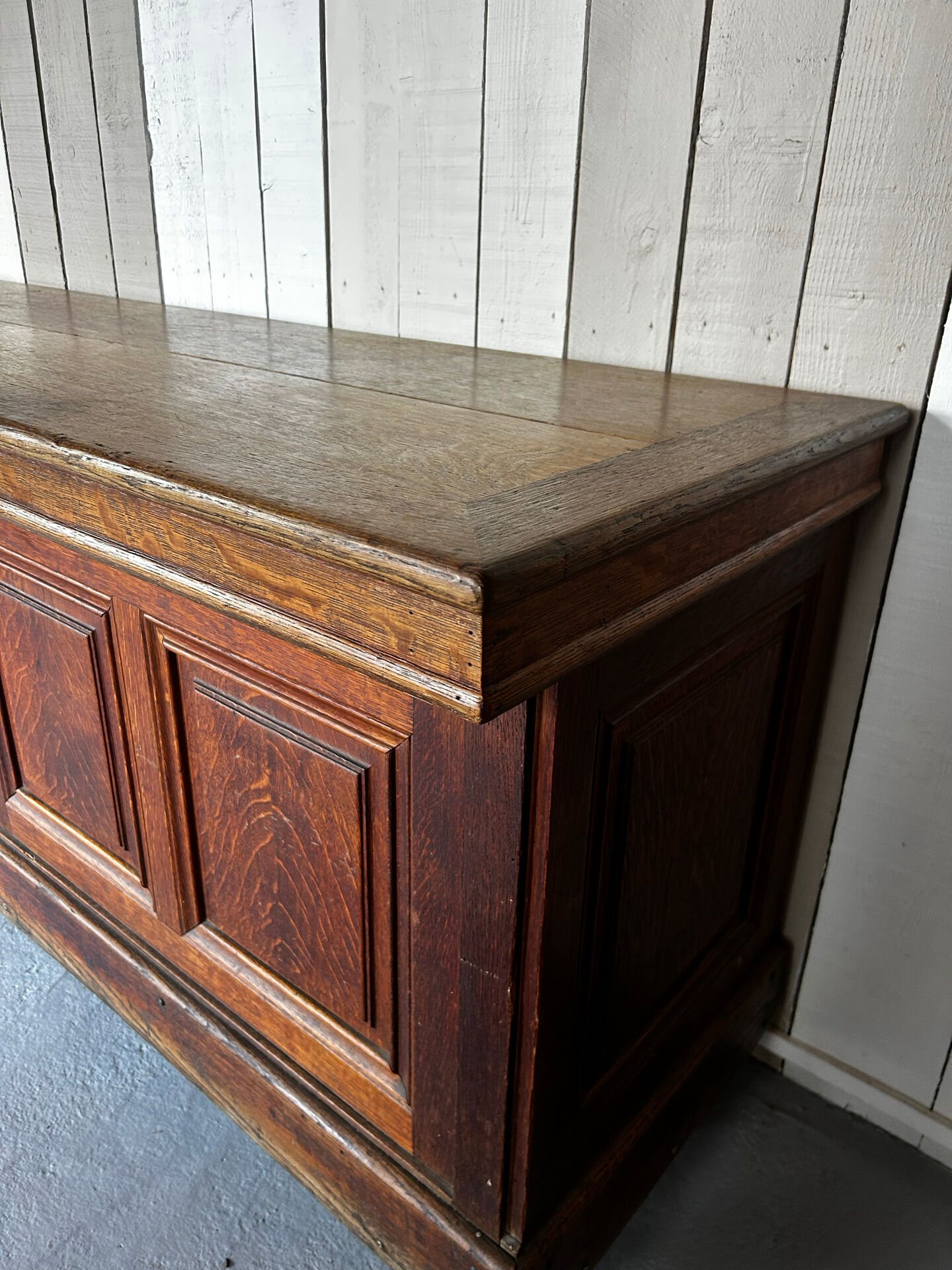 Large antique haberdashery counter in oak
