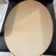 Old oval mirror in gilded wood from the 20th century