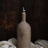 Ergonomic stoneware oil bottle