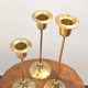 Trio of brass candlesticks
