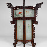 Asian wooden lantern carved with dragons and painted glass panels