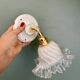 Vintage tulip glass wall light in transparent, slightly pearlescent white.