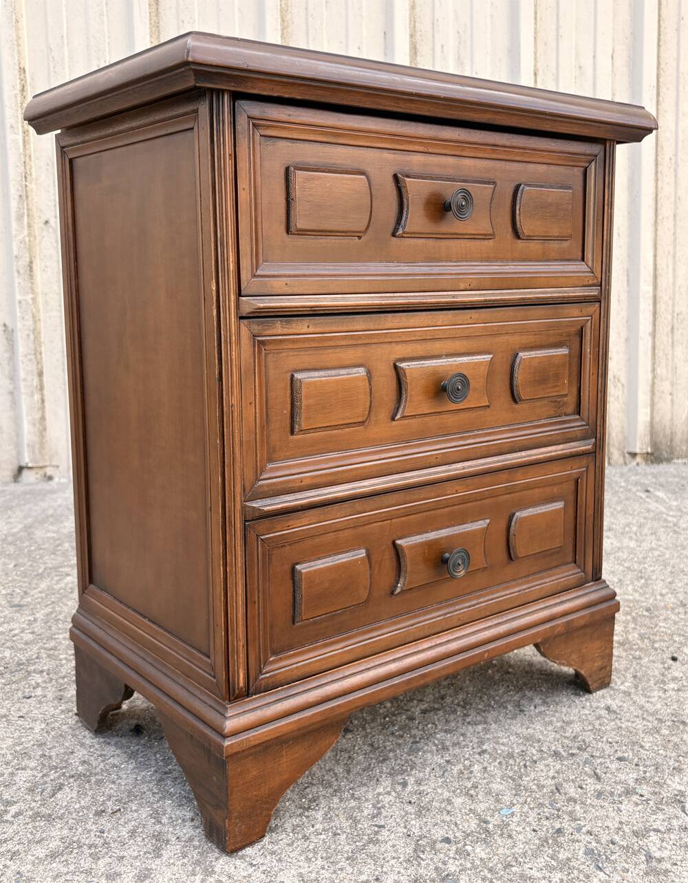Vintage bedside cabinet with three drawers in moulded wood, Louis XV style.