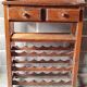 1960 Meuble pitchpin /18 btles H 112 x L88 cm