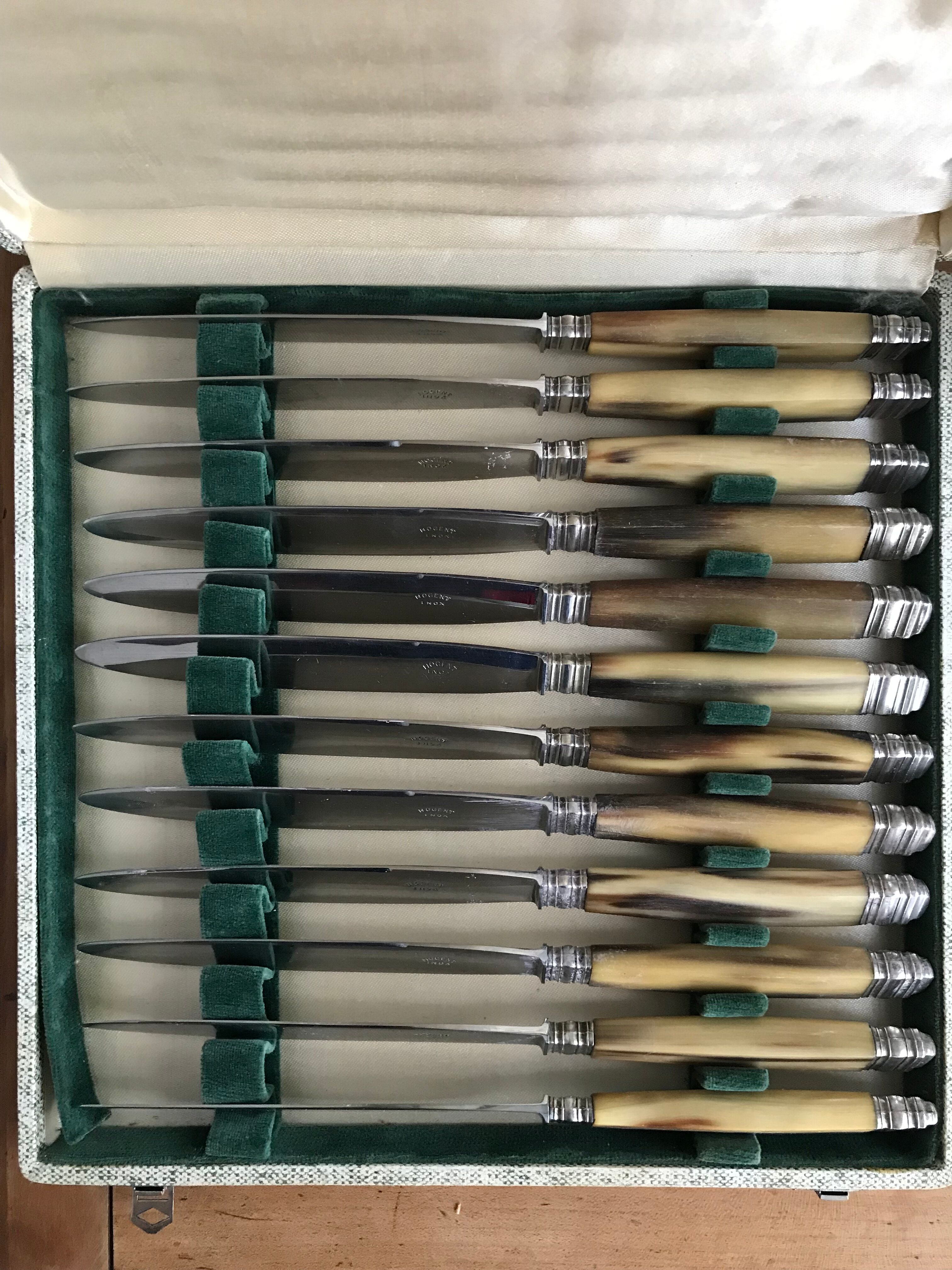 Twelve Art Deco horn and silver knives