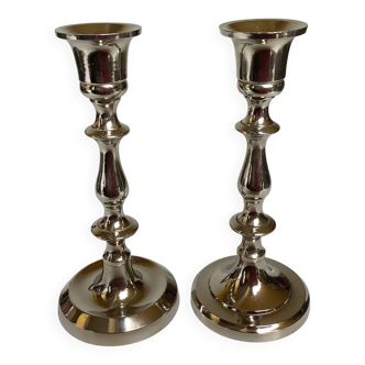 Pair of silver metal candlesticks