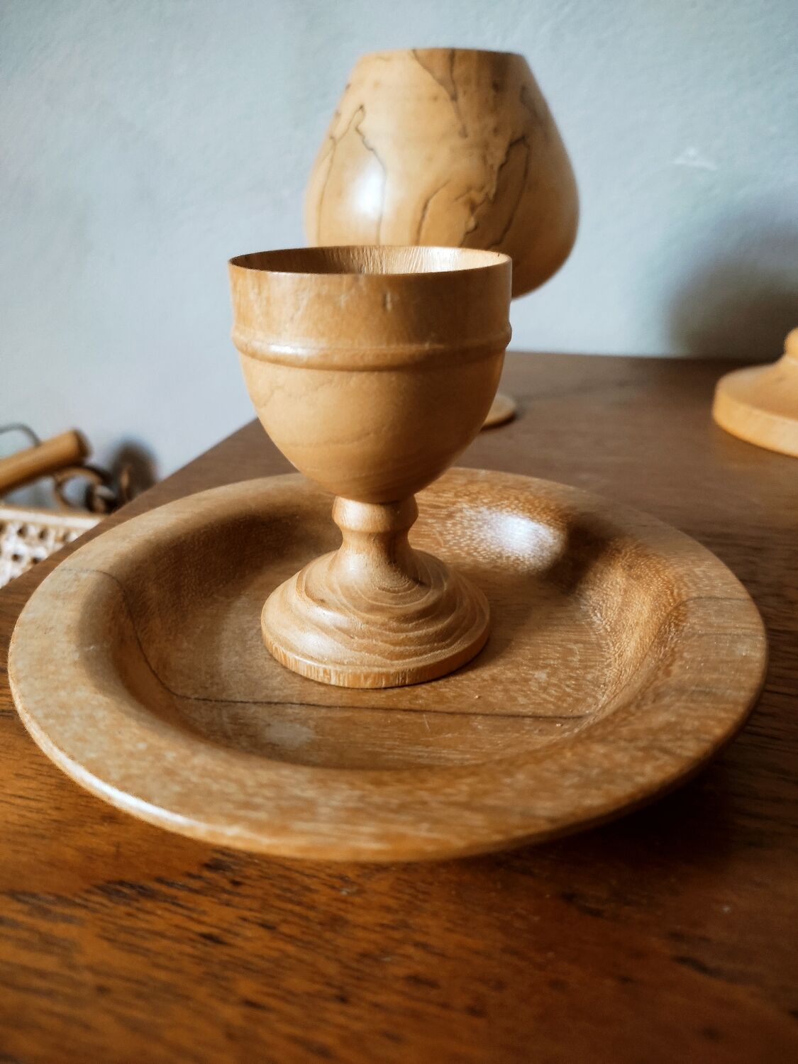 Composition of vases and cups in turned wood