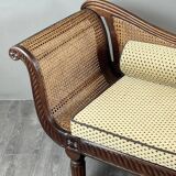 Louis XVI style meridian in carved wood and caning, 19th century.