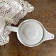 Porcelain teapot with hand-painted bird decoration