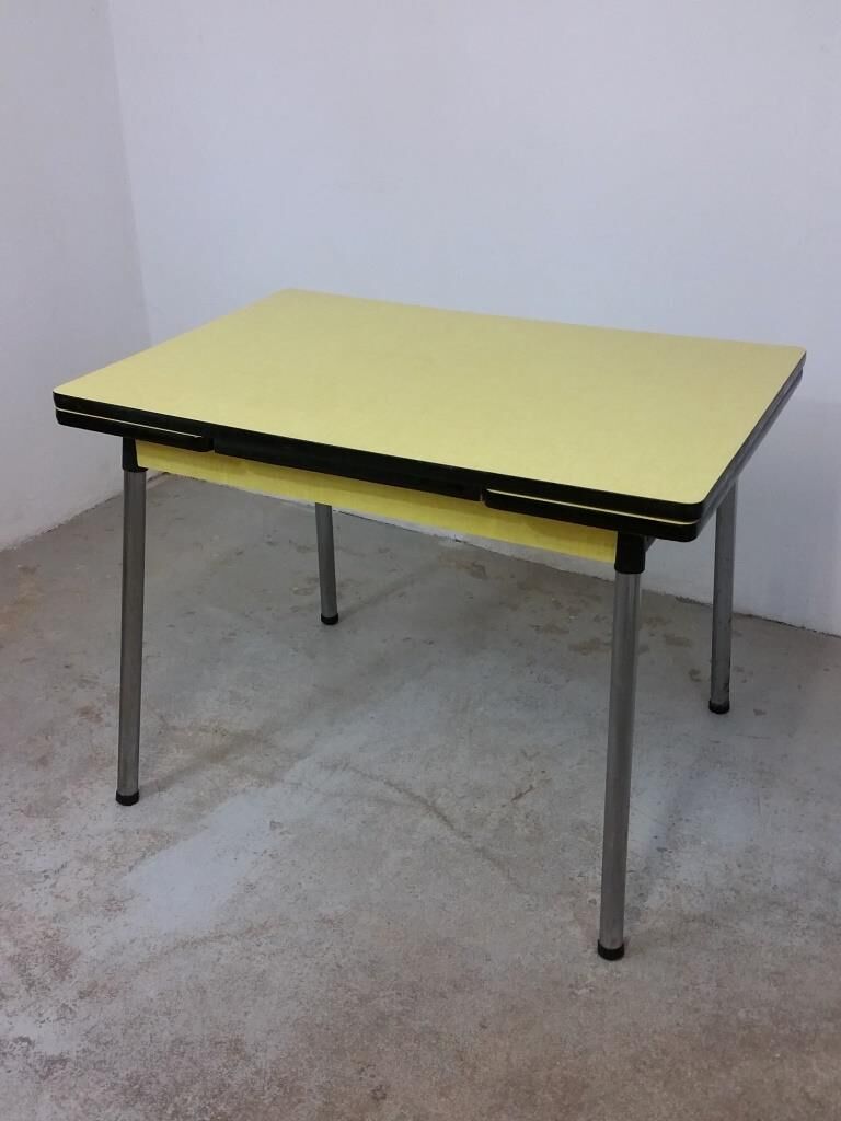Table and chairs in formica yellow