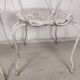 4 wrought iron garden armchairs
