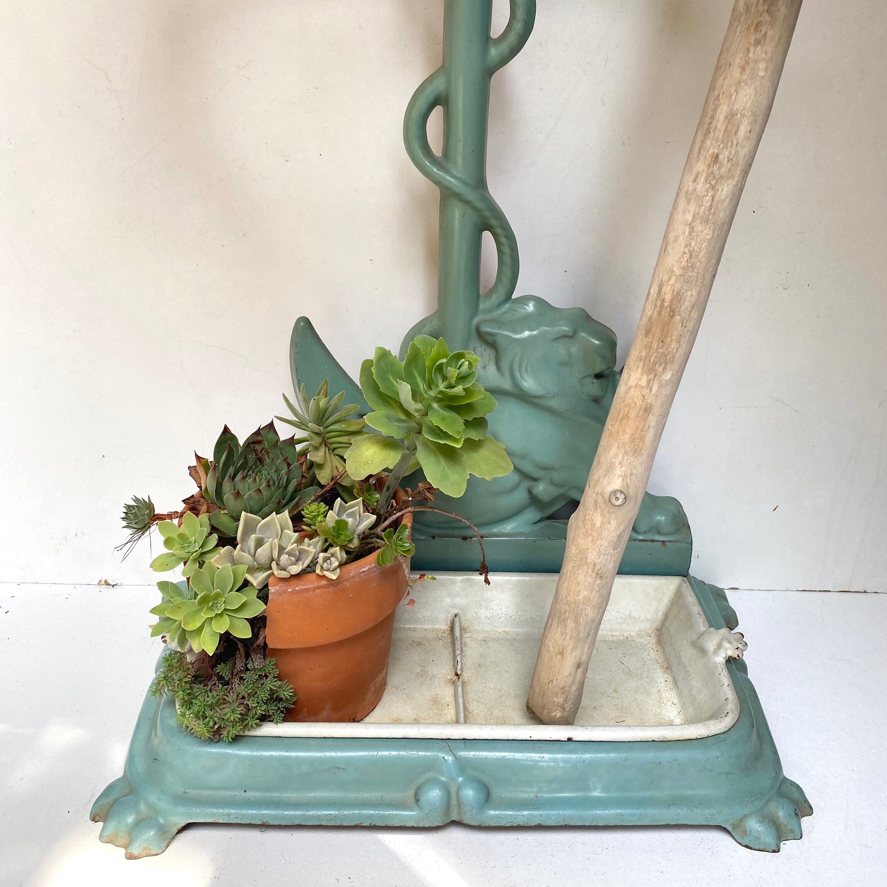 Enameled cast iron umbrella stand from the early 20th century
