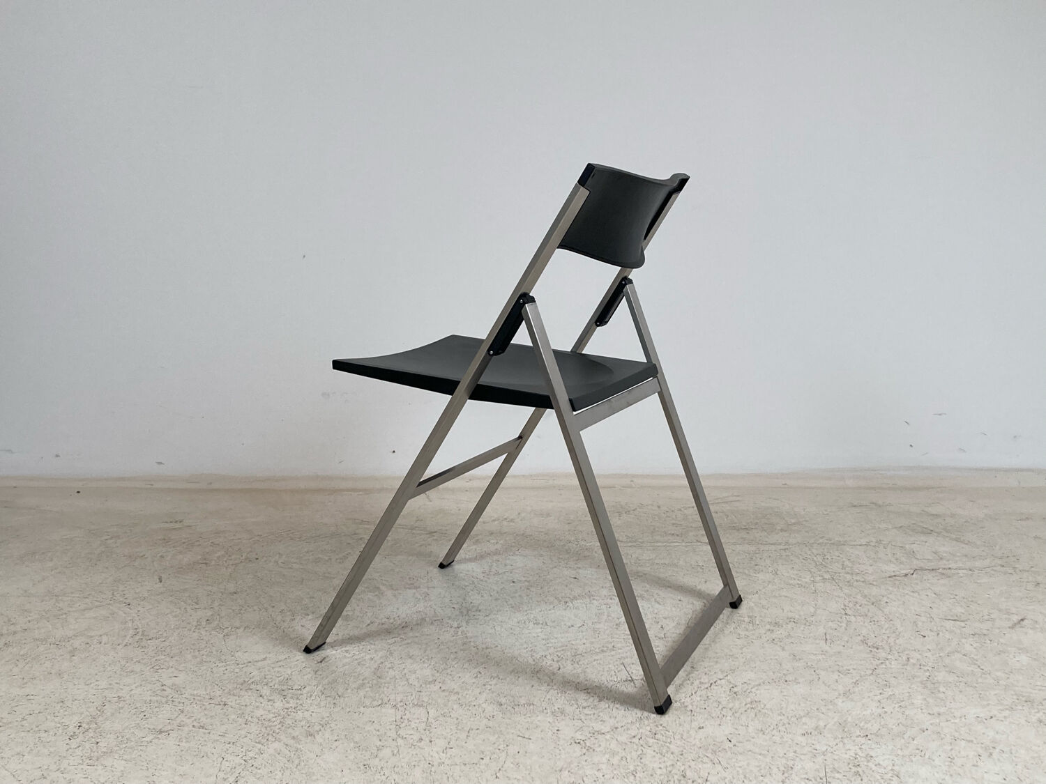 P08 folding chairs by Justus Kolberg for Tecno 1991