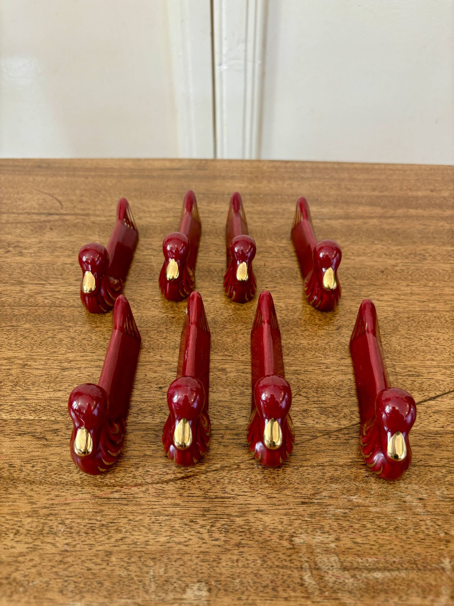 Set of 8 vintage slip knife holders in the shape of red ducks and