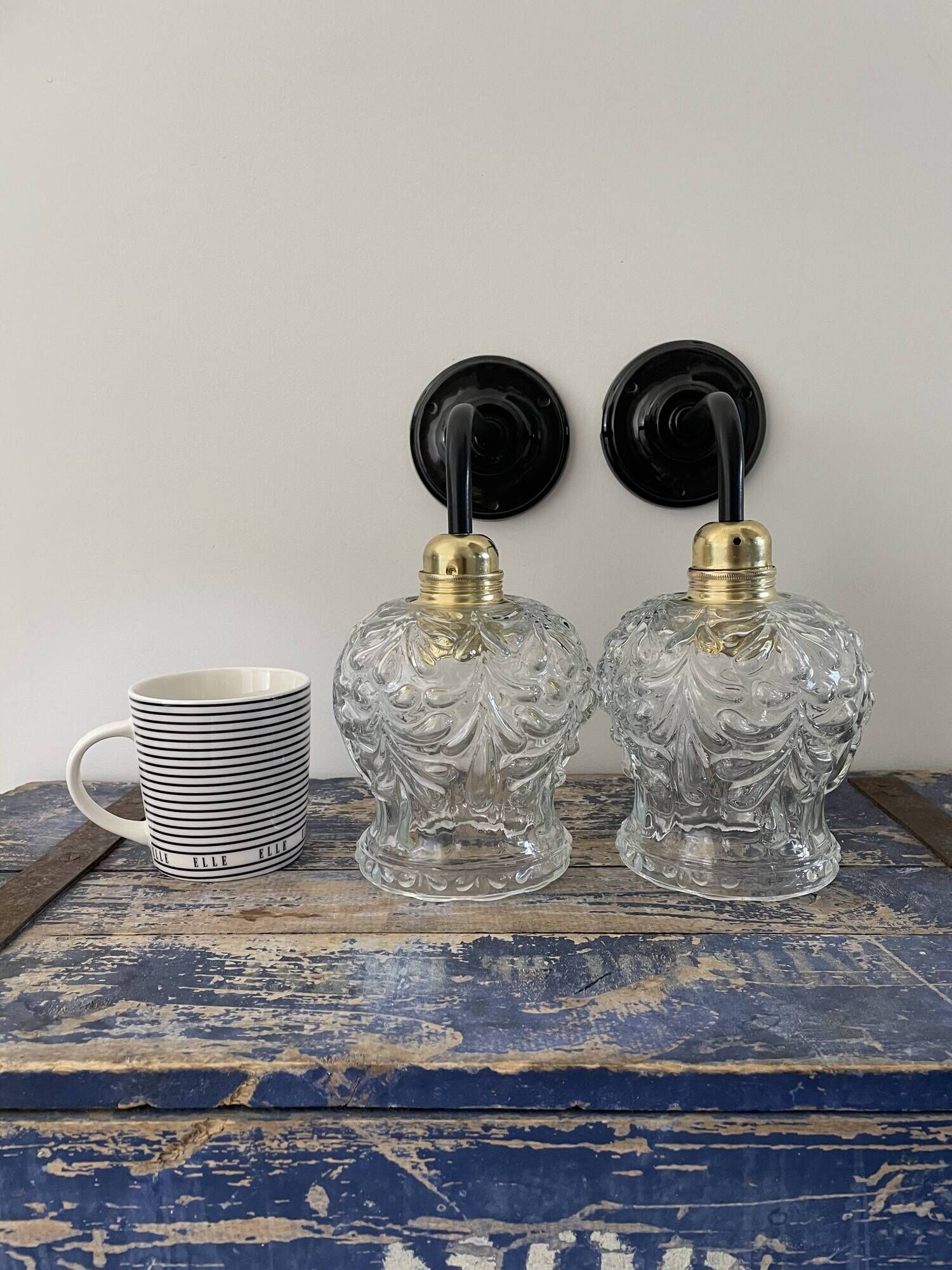 Pair of vintage electrified to nine-piece chiseled glass wall lamps