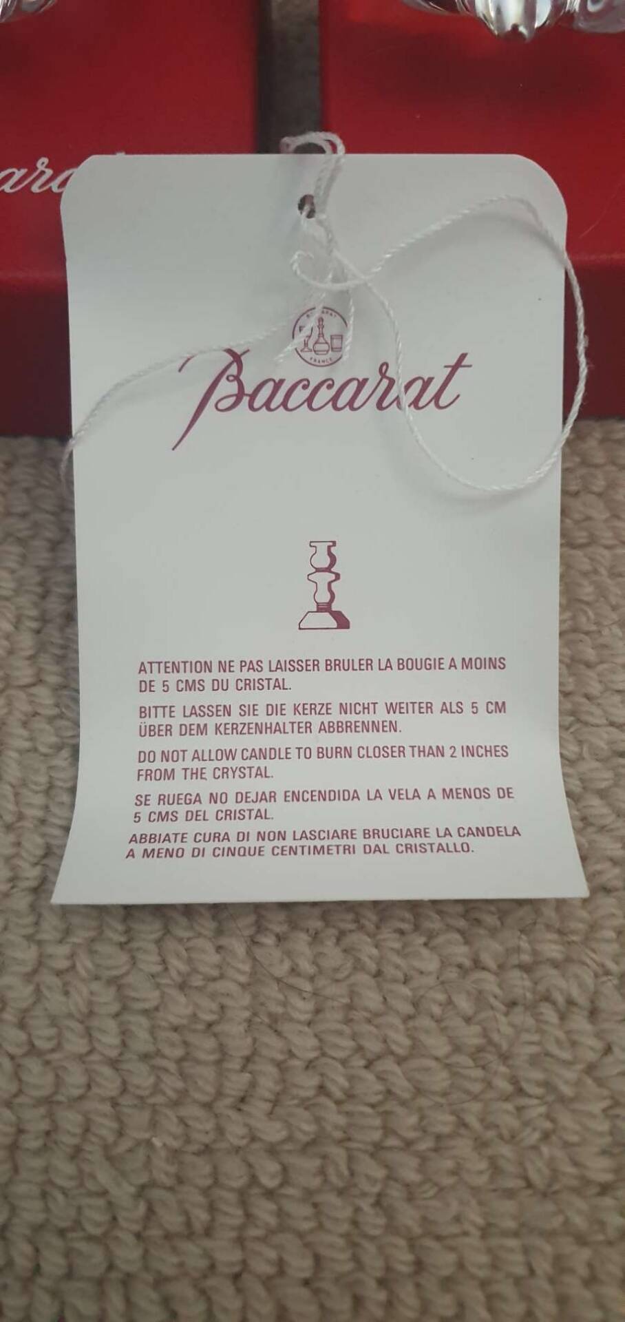 Pair of Baccarat crystal candlesticks, flower/rose model — new condition
