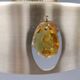 Danish hanging lamp made of glass, metal and with amber colored prisms
