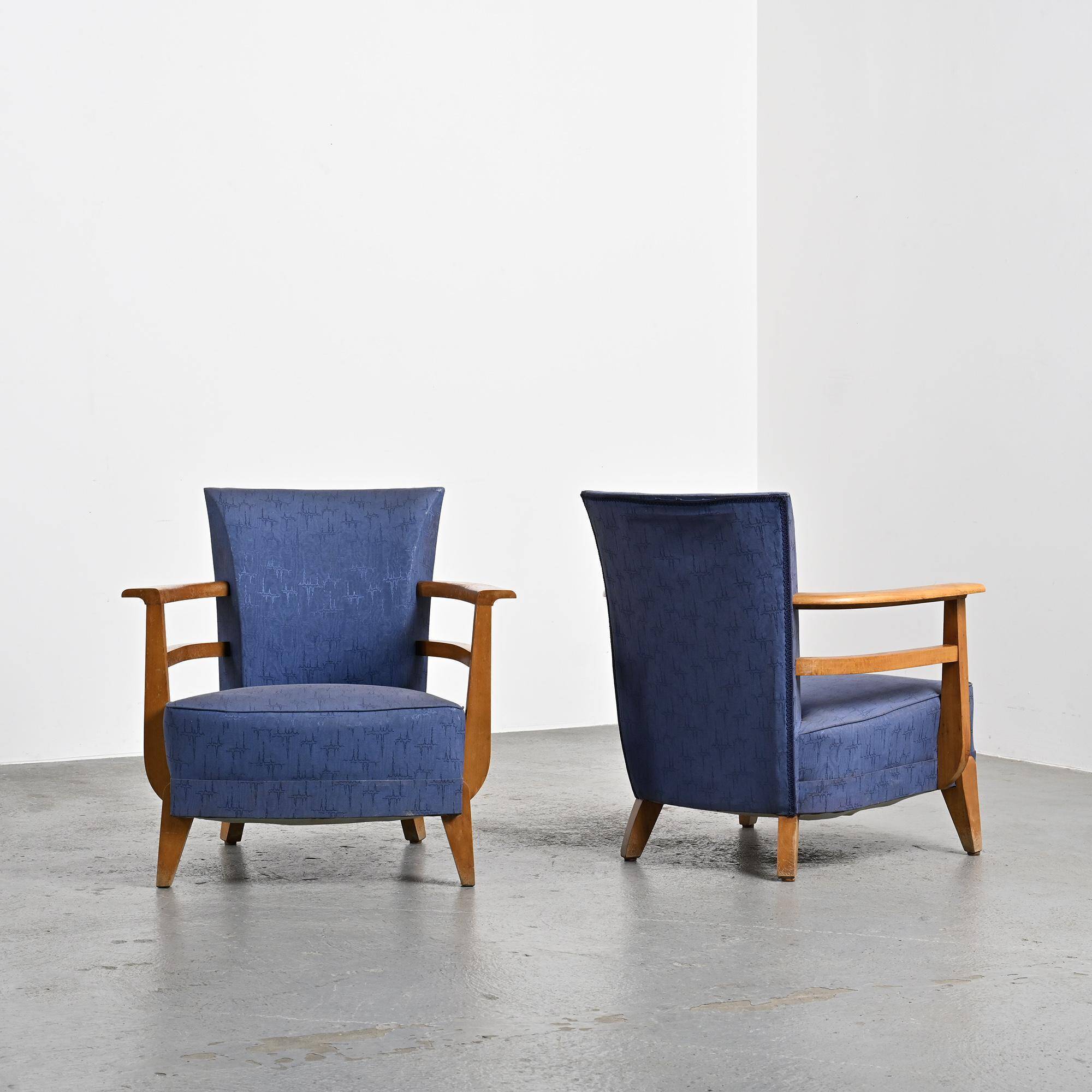 Pair of living room armchairs in solid beech, France, circa 1950.