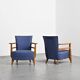 Pair of living room armchairs in solid beech, France, circa 1950.