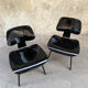 Pair of DCW chairs by Charles & Ray Eames in Black for Herman Miller 1950