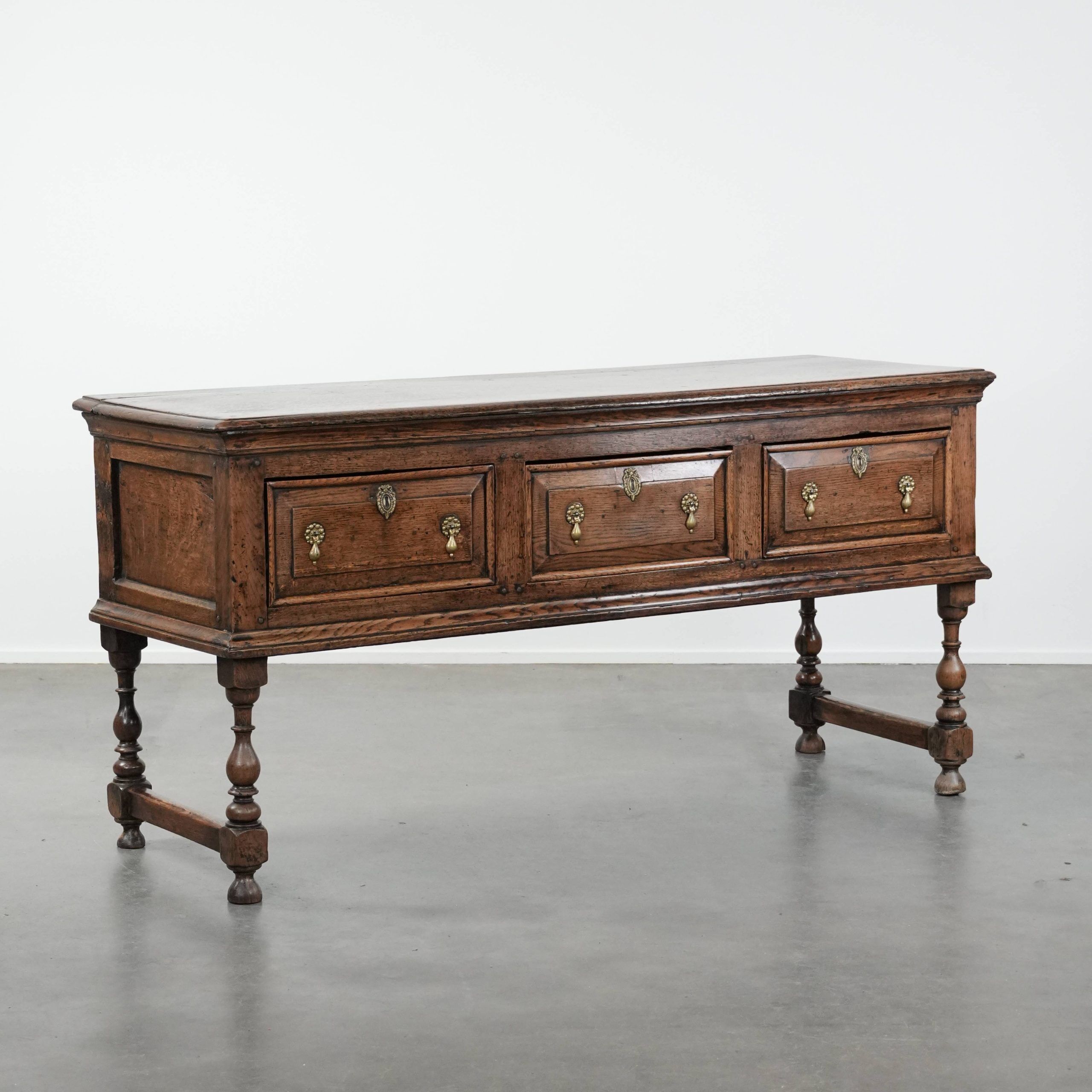 Antique English sideboard from the early 18th century made of oak