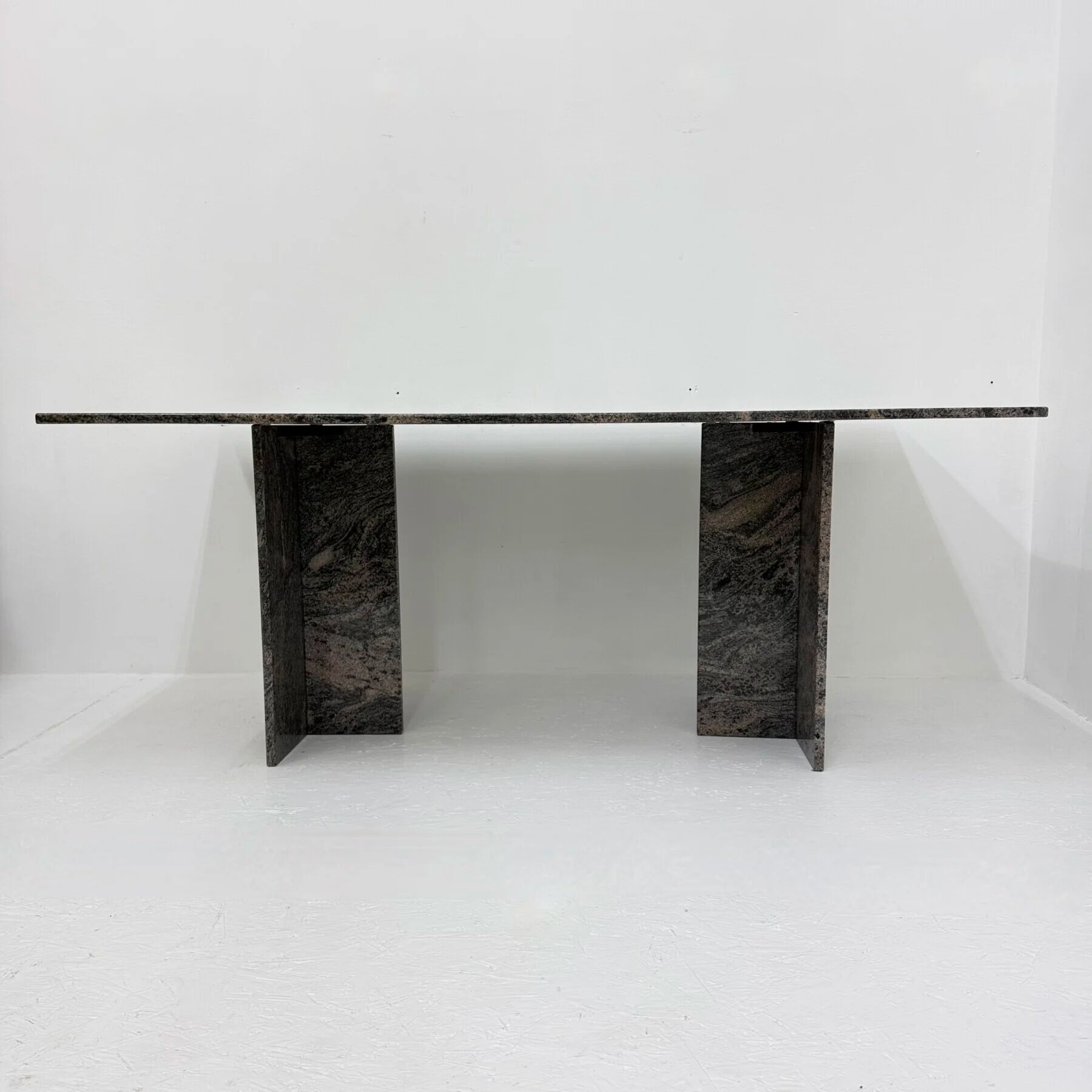 Mid-century design granite dining table, 1970shttps://nuvintage.nl/product/