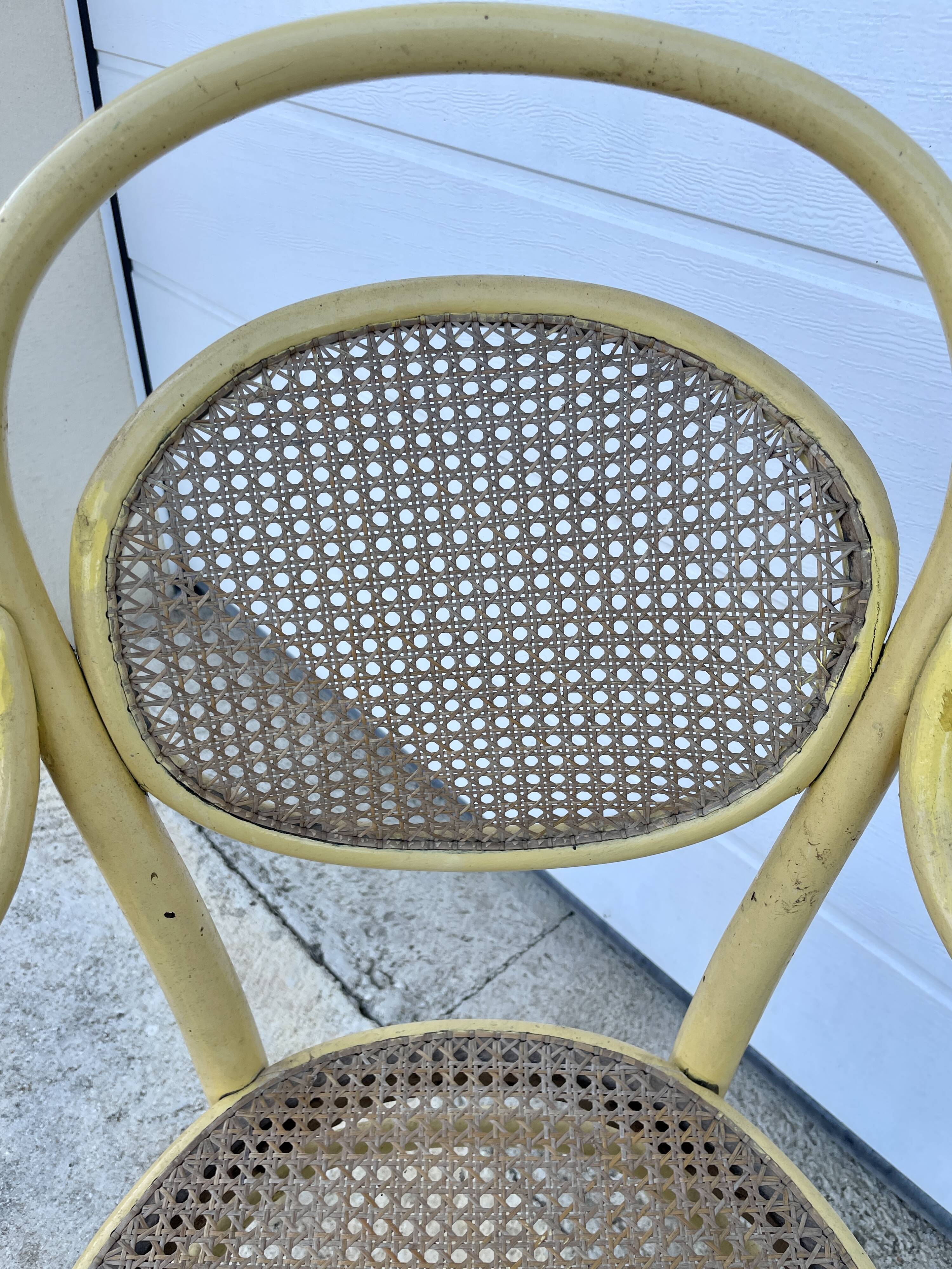 Old armchair Thonet canned wood