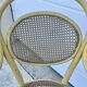 Old armchair Thonet canned wood