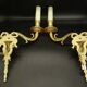 Large pair of wall sconces with male faces in Louis XVI style - bronze