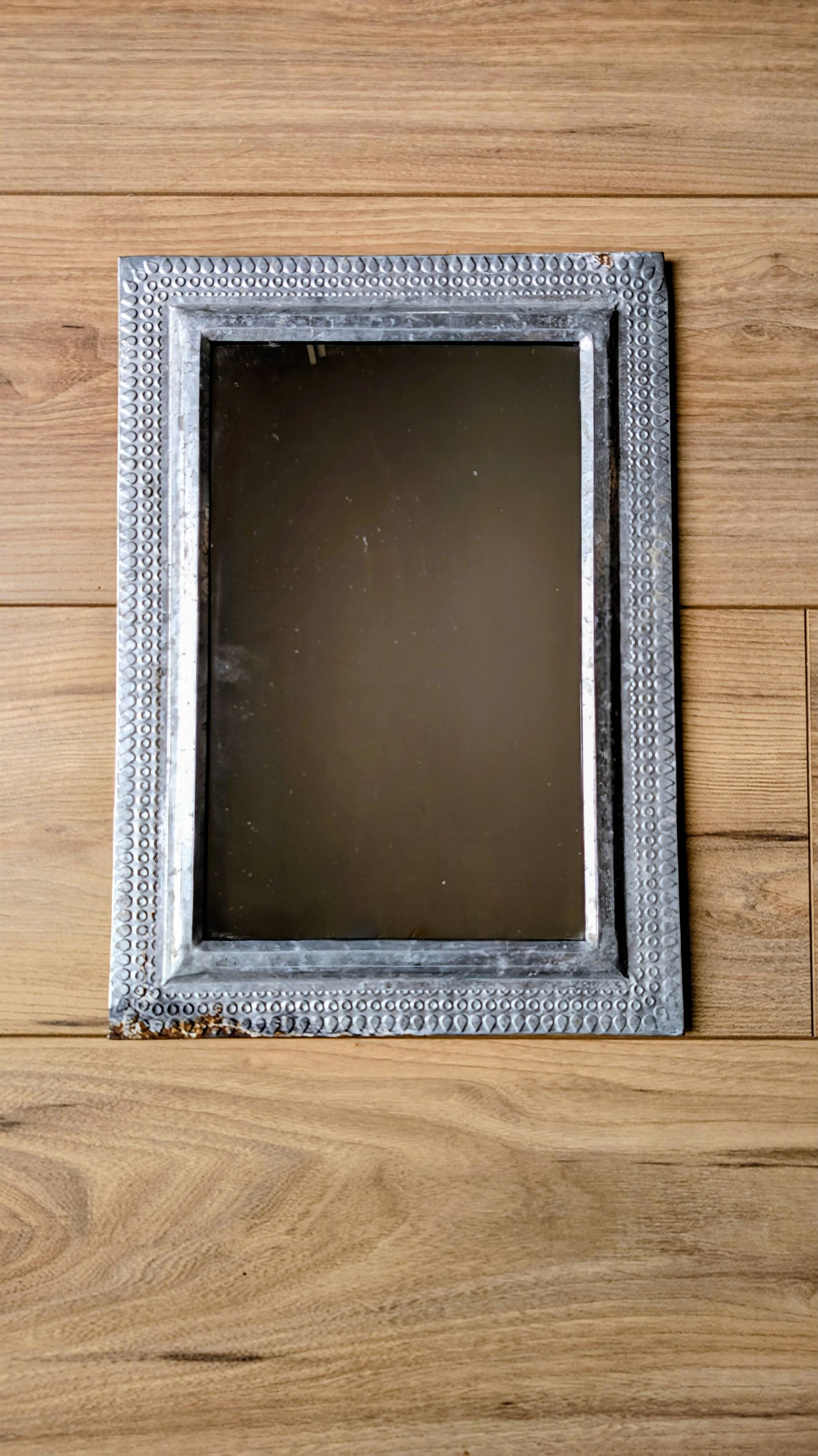 Antique rectangular mirror, hammered metal frame 35 x 25 cm