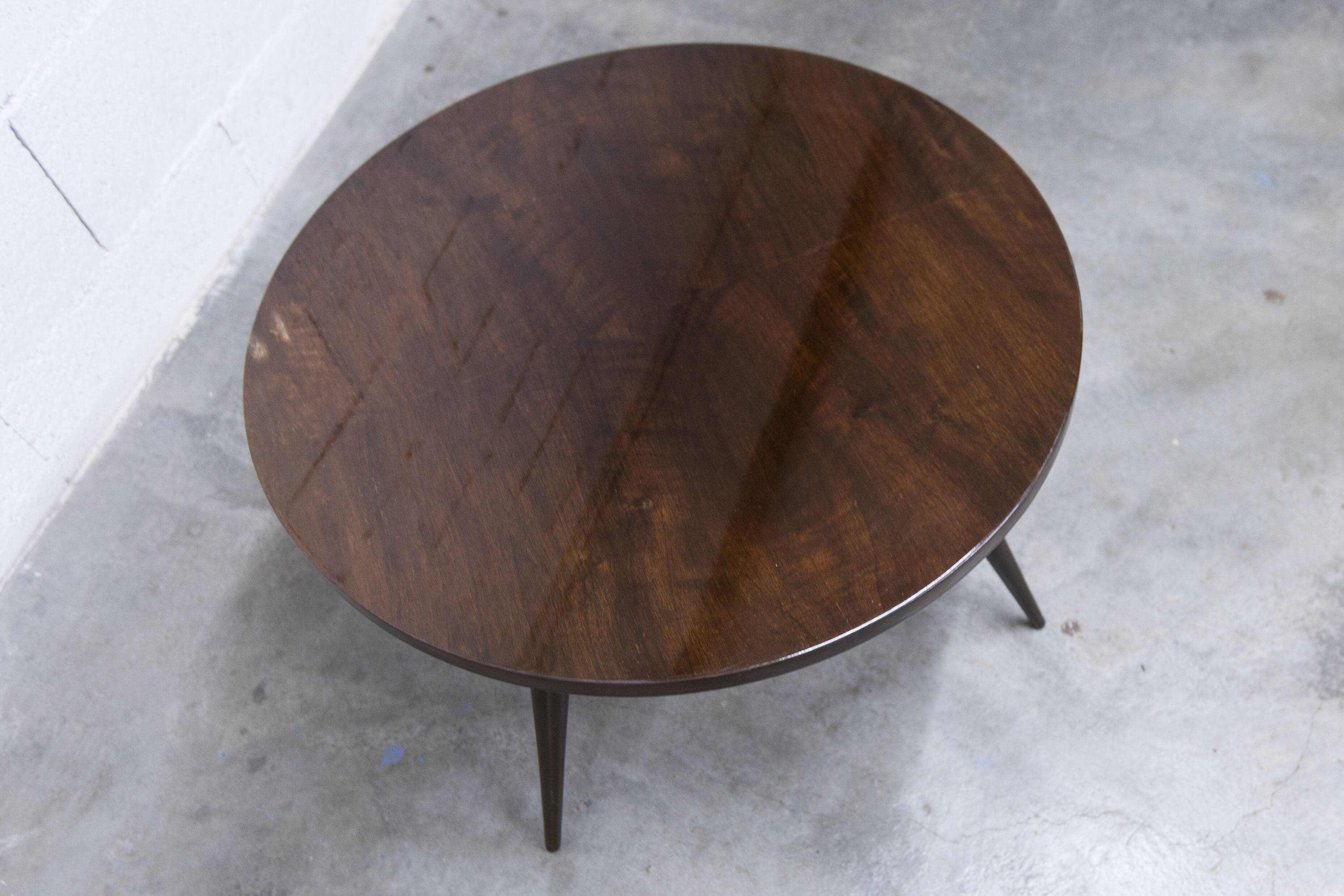1960s Scandinavian tripod coffee table with glossy varnish in mahogany wood.