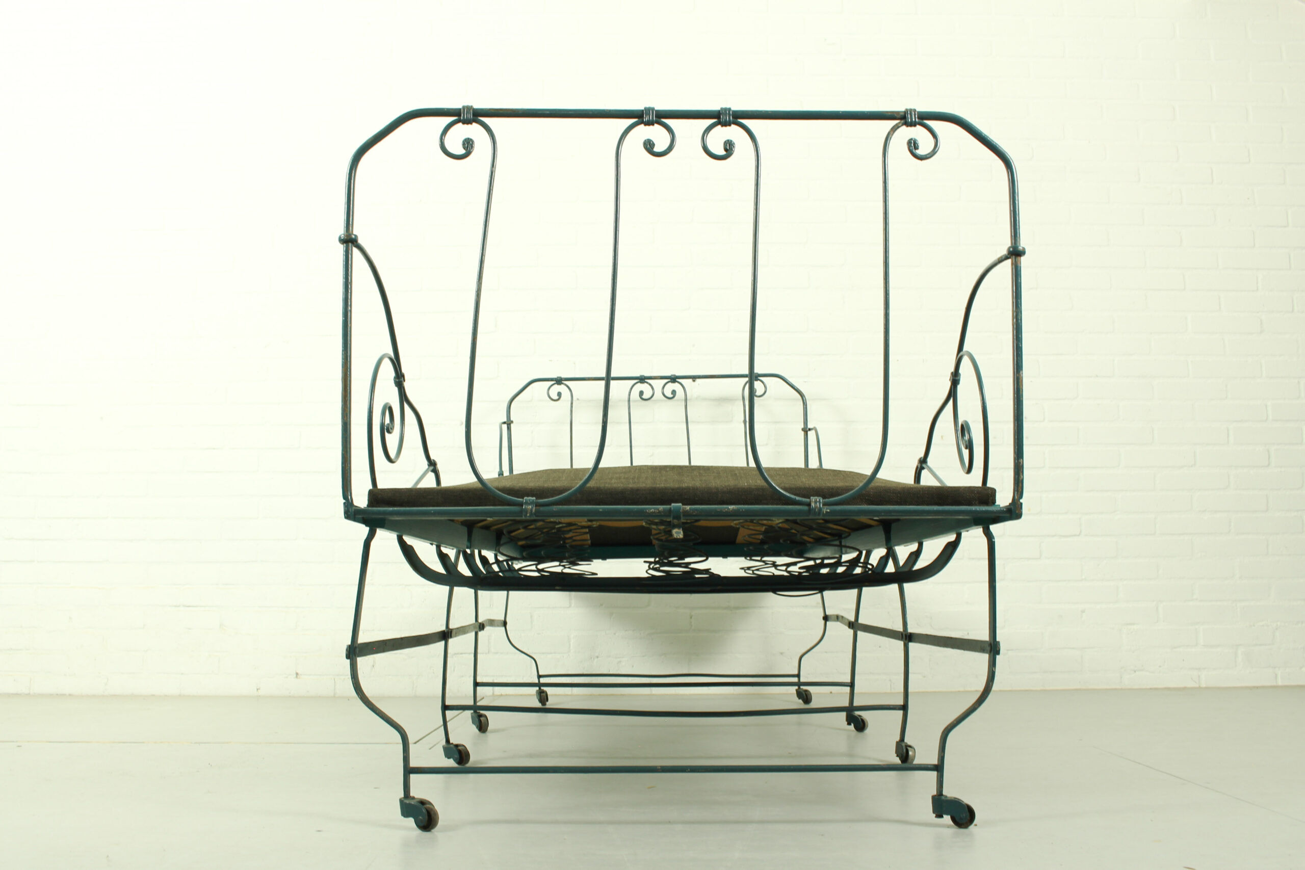 Foldable metal daybed with new webbing and upholstery