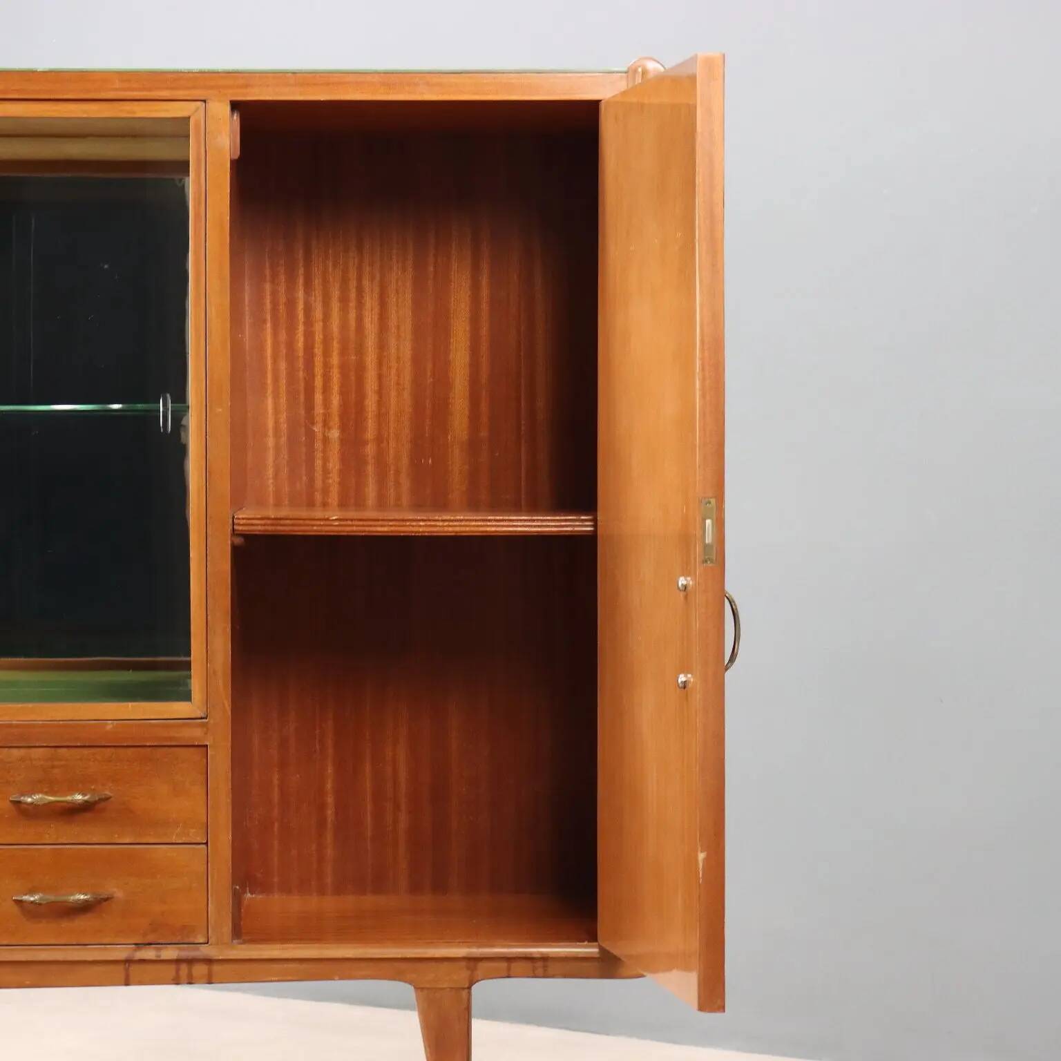 Vintage buffet in walnut veneer, Italian design from the 1960s.