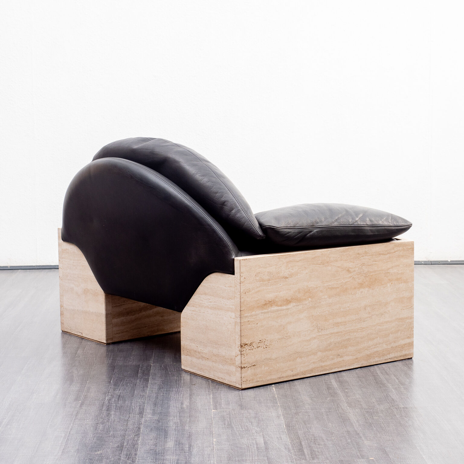 Vintage armchair, leather and travertine