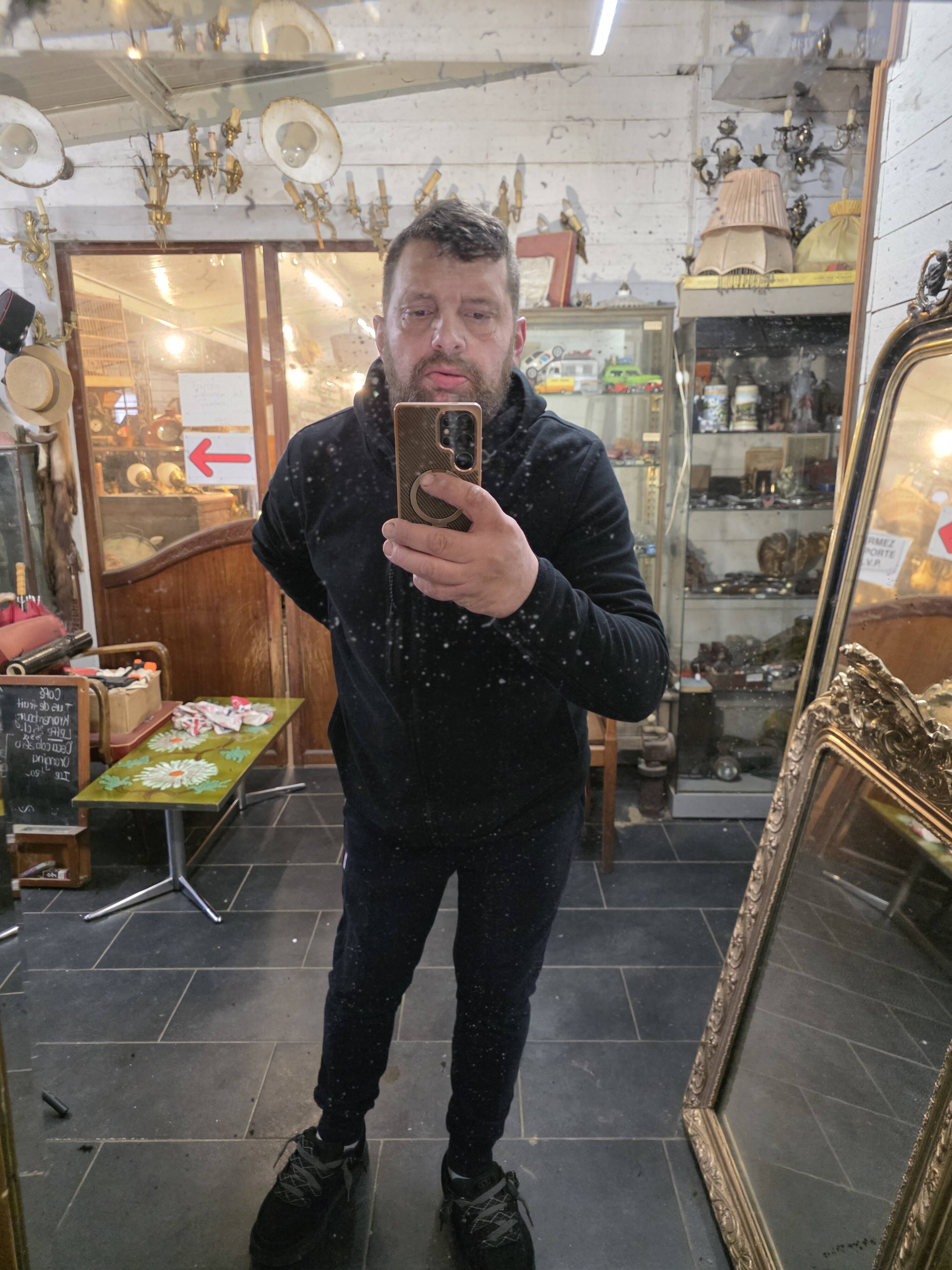 Art Deco gilded trumeau, bevelled mirror