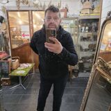 Art Deco gilded trumeau, bevelled mirror