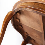 Round dining table of walnut, 1860s