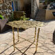 Carved brass coffee table with ginkgo decor