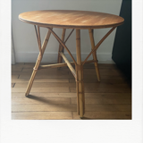 Round coffee table, in rattan and wood