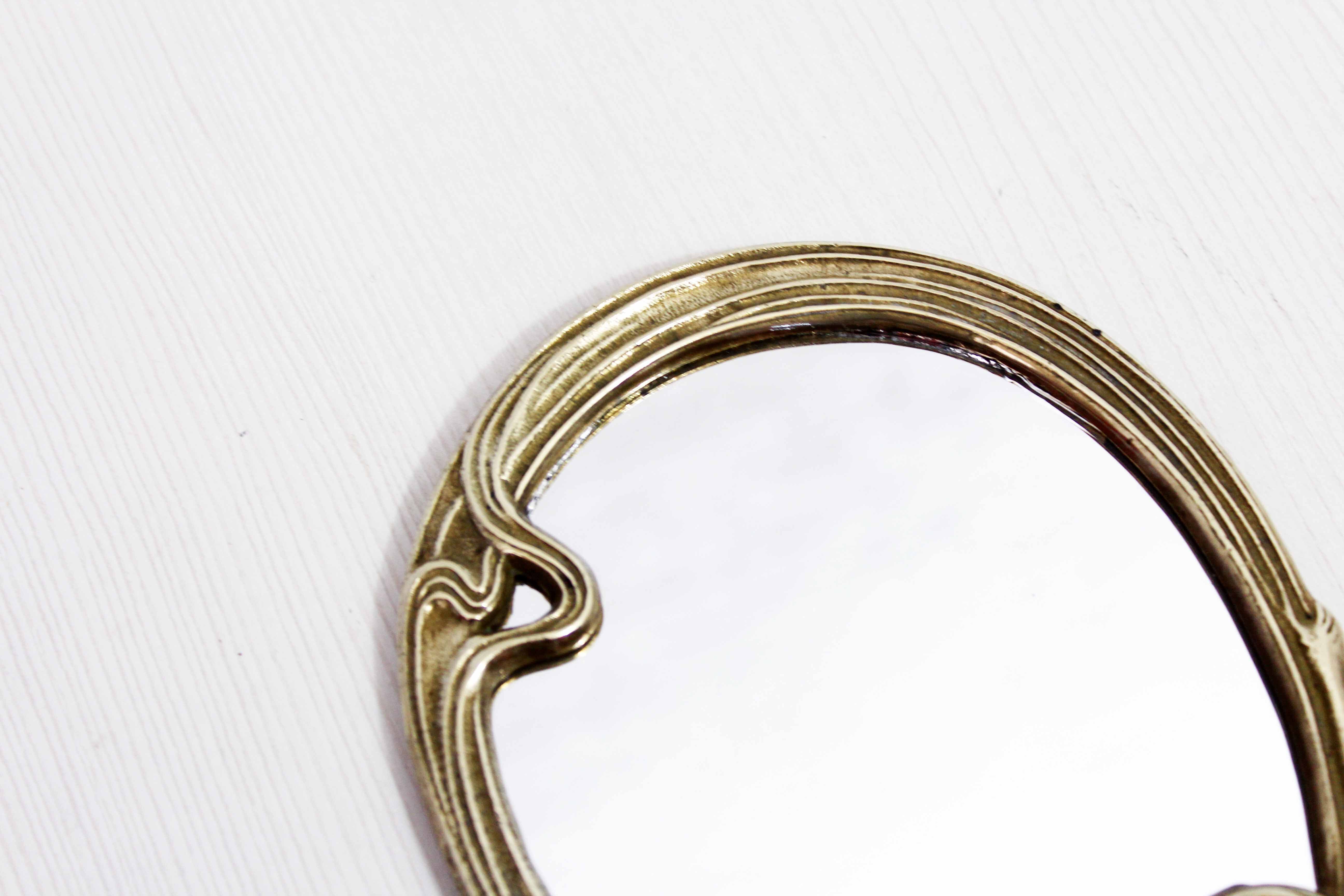 Bronze hand mirror