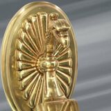 Pair of gilt bronze wall sconces in the Directoire style by Lucien Gau.